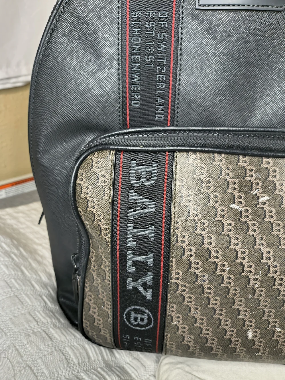 Bally Black leather backpack with brown monogram panel